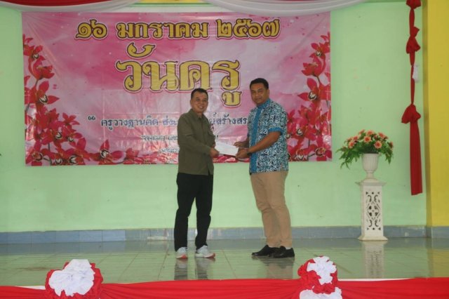 กิจกรรมมอบทุนการศึกษาบุตรสมาชิก อำเภอจะแนะ